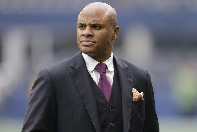 Houston Texans general manager Rick Smith stands the field before an NFL football game against the Seattle Seahawks, Sunday, Oct. 29, 2017, in Seattle. (AP Photo/Stephen Brashear)