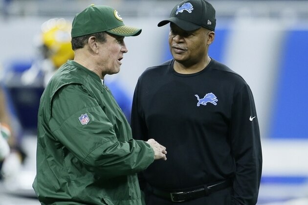 Green Bay Packers defensive coordinator Dom Capers, left, talks with Detroit Lions head coach Jim Caldwell during pregame of an NFL football game, Sunday, Dec. 31, 2017, in Detroit. (AP Photo/Duane Burleson)
