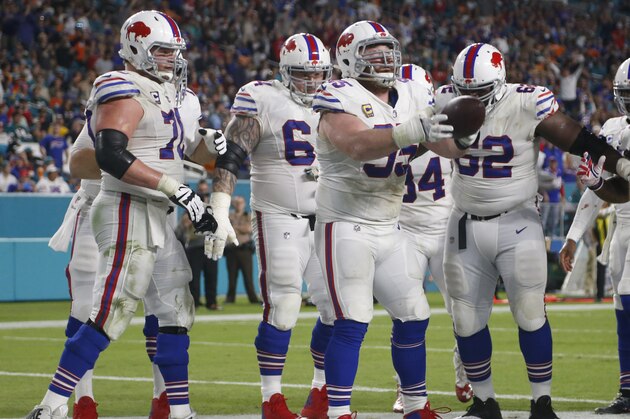 Buffalo Bills defensive tackle Kyle Williams (95) celebrates with his teammates after scoring a touchdown, during the second half of an NFL football game, Sunday, Dec. 31, 2017, in Miami Gardens, Fla. (AP Photo/Wilfredo Lee)