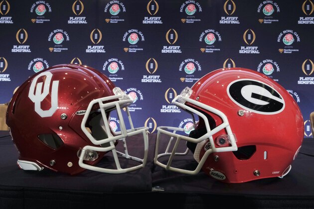 Helmets for Georgia and Oklahoma are displayed at a news conference in Los Angeles on Thursday, Dec. 28, 2017. Georgia will take on Oklahoma on Monday, Jan. 1, 2018. (AP Photo/Richard Vogel)