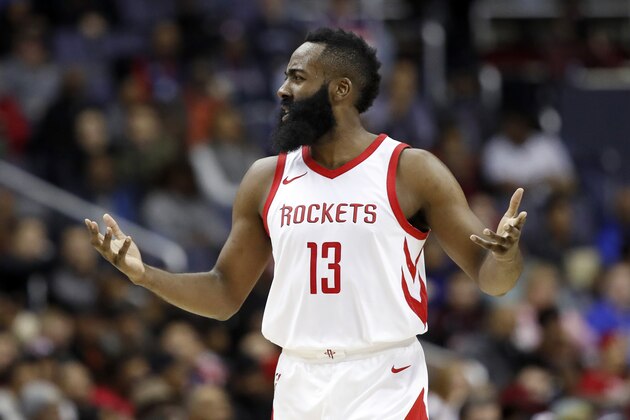 Houston Rockets guard James Harden (13) reacts during the second half of an NBA basketball game against the Washington Wizards, Friday, Dec. 29, 2017, in Washington. The Wizards won 121-103. (AP Photo/Alex Brandon)