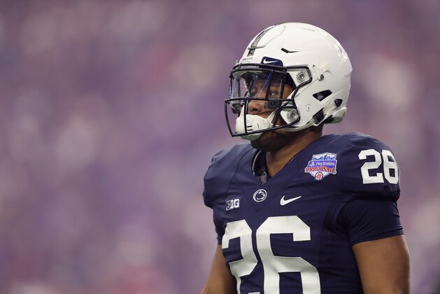 GLENDALE, AZ - DECEMBER 30:  Running back Saquon Barkley #26 of the Penn State Nittany Lions walks on the field during the first half of the Playstation Fiesta Bowl against the Washington Huskies at University of Phoenix Stadium on December 30, 2017 in Glendale, Arizona.  (Photo by Christian Petersen/Getty Images)