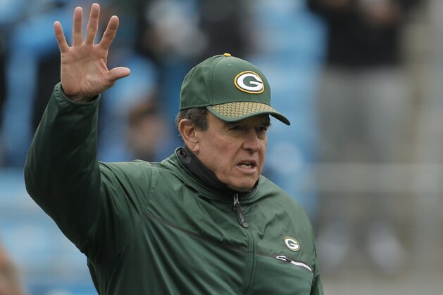 Green Bay Packers defensive coordinator Dom Capers watches his team warm up before an NFL football game against the Carolina Panthers in Charlotte, N.C., Sunday, Dec. 17, 2017. (AP Photo/Bob Leverone)