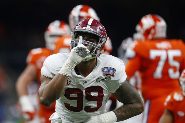 Alabama defensive lineman Raekwon Davis (99) gestures after a stop in the first half of the Sugar Bowl semi-final playoff game against Clemson for the NCAA college football national championship, in New Orleans, Monday, Jan. 1, 2018. (AP Photo/Butch Dill)
