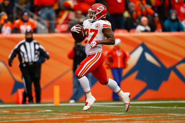 DENVER, CO - DECEMBER 31:  Running back Kareem Hunt #27 of the Kansas City Chiefs scores a first-quarter touchdown against the Denver Broncos at Sports Authority Field at Mile High on December 31, 2017 in Denver, Colorado. (Photo by Justin Edmonds/Getty Images)