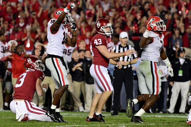 PASADENA, CA - JANUARY 01: Georgia Bulldogs and Oklahoma Sooners react after Lorenzo Carter #7 of the Georgia Bulldogs blocks the field goal attempt from Austin Seibert #43 of the Oklahoma Sooners in the 2018 College Football Playoff Semifinal Game at the Rose Bowl Game presented by Northwestern Mutual at the Rose Bowl on January 1, 2018 in Pasadena, California.  (Photo by Harry How/Getty Images)