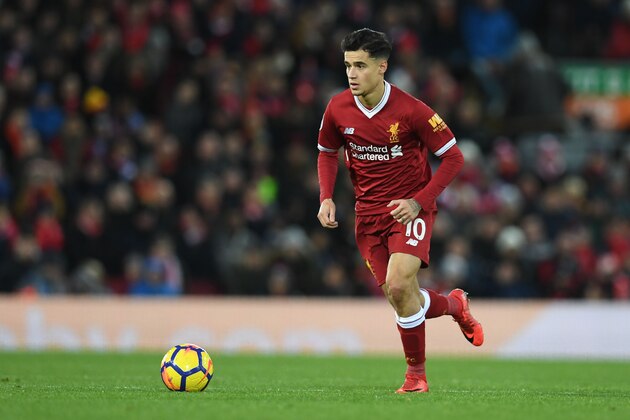Liverpool's Brazilian midfielder Philippe Coutinho controls the ball during the English Premier League football match between Liverpool and Leicester at Anfield in Liverpool, north west England on December 30, 2017. / AFP PHOTO / Paul ELLIS / RESTRICTED TO EDITORIAL USE. No use with unauthorized audio, video, data, fixture lists, club/league logos or 'live' services. Online in-match use limited to 75 images, no video emulation. No use in betting, games or single club/league/player publications.  /         (Photo credit should read PAUL ELLIS/AFP/Getty Images)