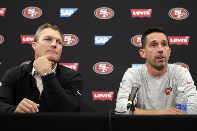 San Francisco 49ers head coach Kyle Shanahan, right, and general manager John Lynch field questions during the NFL team's football training camp Thursday, July 27, 2017, in Santa Clara, Calif. (AP Photo/Marcio Jose Sanchez)