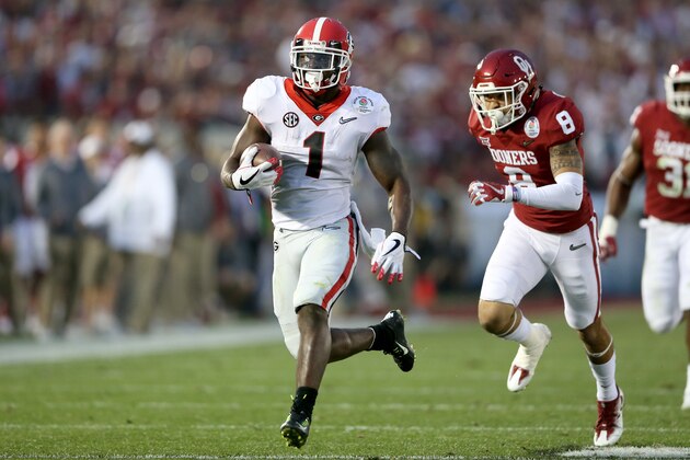 PASADENA, CA - JANUARY 01:  Running back Sony Michel #1 of the Georgia Bulldogs scores on a 38-yard touchdown in the third quarter against the the Oklahoma Sooners in the 2018 College Football Playoff Semifinal at the Rose Bowl Game presented by Northwestern Mutual at the Rose Bowl on January 1, 2018 in Pasadena, California.  (Photo by Matthew Stockman/Getty Images)