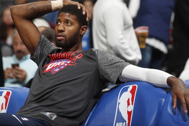 Oklahoma City Thunder forward Paul George (13) in the first half of an NBA basketball game Thursday, Nov. 9, 2017, in Denver. (AP Photo/David Zalubowski)