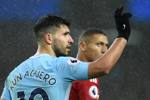 Manchester City's Argentinian striker Sergio Aguero celebrates after scoring their third goal during the English Premier League football match between Manchester City and Watford at the Etihad Stadium in Manchester, north west England, on January 2, 2018. / AFP PHOTO / Oli SCARFF / RESTRICTED TO EDITORIAL USE. No use with unauthorized audio, video, data, fixture lists, club/league logos or 'live' services. Online in-match use limited to 75 images, no video emulation. No use in betting, games or single club/league/player publications. / (Photo credit should read OLI SCARFF/AFP/Getty Images) Manchester City's Argentinian striker Sergio Aguero celebrates after scoring their third goal during the English Premier League football match between Manchester City and Watford at the Etihad Stadium in Manchester, north west England, on January 2, 2018. / AFP PHOTO / Oli SCARFF / RESTRICTED TO EDITORIAL USE. No use with unauthorized audio, video, data, fixture lists, club/league logos or 'live' services. Online in-match use limited to 75 images, no video emulation. No use in betting, games or single club/league/player publications. / (Photo credit should read OLI SCARFF/AFP/Getty Images)