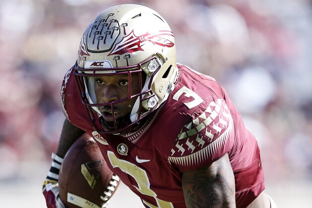 TALLAHASSEE, FL - NOVEMBER 18: Safety Derwin James #3 of the Florida State Seminoles makes an interception for a touchdown during the game against the Delaware State Hornets at Doak Campbell Stadium on Bobby Bowden Field on November 18, 2017 in Tallahassee, Florida. Florida State defeated Delaware State 77 to 6. (Photo by Don Juan Moore/Getty Images)