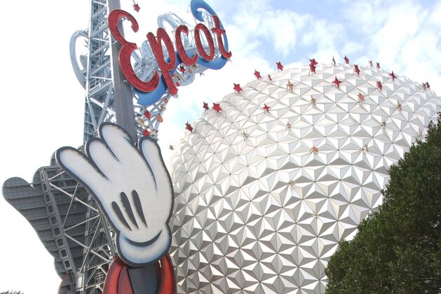 Runners make their way past Spaceship Earth in the Epcot theme park during the Walt Disney World Marathon in Lake Buena Vista, Fla., Sunday, Jan. 12, 2003. More than 22,000 racers took part in the tenth anniversary of the event. (AP Photo/Phelan M. Ebenhack)