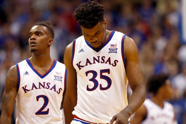 LAWRENCE, KS - JANUARY 02:  Udoka Azubuike #35 and Lagerald Vick #2 of the Kansas Jayhawks walk onto the court after a timeout during the game against the Texas Tech Red Raiders at Allen Fieldhouse on January 2, 2018 in Lawrence, Kansas.  (Photo by Jamie Squire/Getty Images)