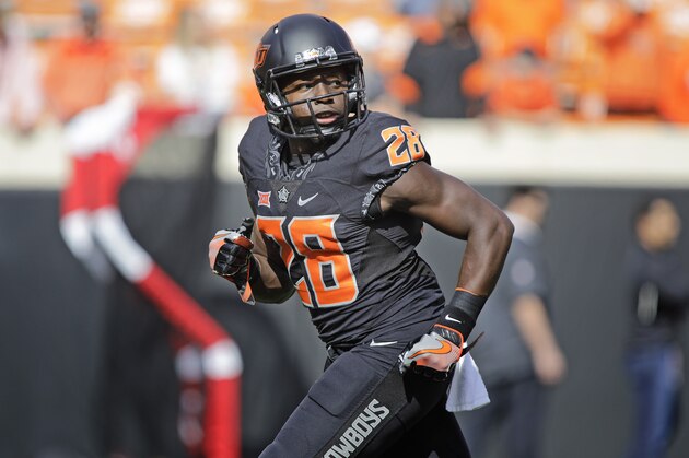 STILLWATER, OK - NOVEMBER 04: Wide receiver James Washington #28 of the Oklahoma State Cowboys warms up before the game against the Oklahoma Sooners at Boone Pickens Stadium on November 4, 2017 in Stillwater, Oklahoma. Oklahoma defeated Oklahoma State 62-52.  (Photo by Brett Deering/Getty Images)