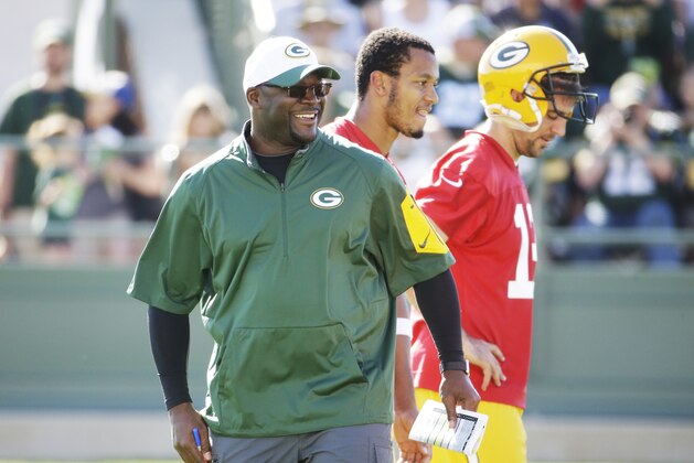 Green Bay Packers offensive coordinator Edgar Bennett watches a drill during NFL football training camp Thursday, July 30, 2015, in Green Bay, Wis. (AP Photo/Morry Gash)