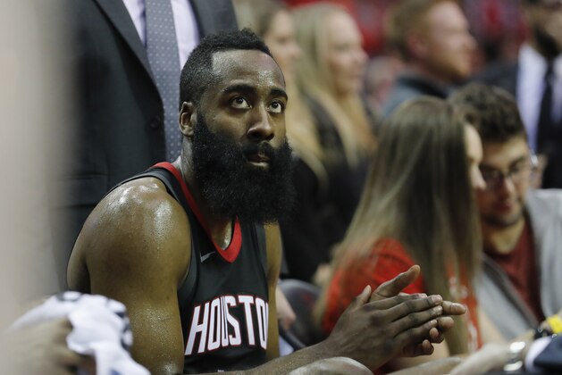 HOUSTON, TX - DECEMBER 31:  James Harden #13 of the Houston Rockets claps on the bench in the second half against the Los Angeles Lakers at Toyota Center on December 31, 2017 in Houston, Texas.  NOTE TO USER: User expressly acknowledges and agrees that, by downloading and or using this photograph, User is consenting to the terms and conditions of the Getty Images License Agreement.  (Photo by Tim Warner/Getty Images)