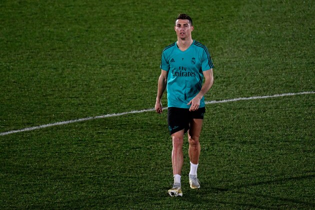 Real Madrid's Portuguese forward Cristiano Ronaldo walks off the pitch at the end of a training session in Madrid on December 30, 2017. / AFP PHOTO / PIERRE-PHILIPPE MARCOU        (Photo credit should read PIERRE-PHILIPPE MARCOU/AFP/Getty Images)
