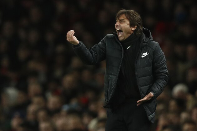 Chelsea's Italian head coach Antonio Conte gestures during the English Premier League football match between Arsenal and Chelsea at the Emirates Stadium in London on January 3, 2018.  / AFP PHOTO / Adrian DENNIS / RESTRICTED TO EDITORIAL USE. No use with unauthorized audio, video, data, fixture lists, club/league logos or 'live' services. Online in-match use limited to 75 images, no video emulation. No use in betting, games or single club/league/player publications.  /         (Photo credit should read ADRIAN DENNIS/AFP/Getty Images)