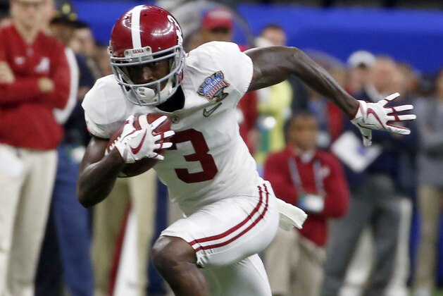 Alabama wide receiver Calvin Ridley (3) carries the ball after a reception in the first half of the Sugar Bowl semi-final playoff game against Clemson for the NCAA college football national championship, in New Orleans, Monday, Jan. 1, 2018. (AP Photo/Butch Dill)