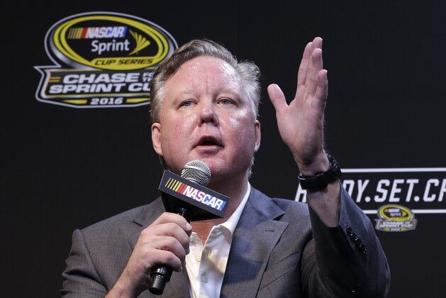 NASCAR CEO and Chairman, Brian France talks to reporters during a news conference before the NASCAR Sprint Cup auto race practice Sunday, Nov. 20, 2016, in Homestead, Fla. (AP Photo/Alan Diaz)