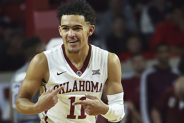 Oklahoma guard Trae Young celebrates after a fast-break basket against Northwestern during the first half of an NCAA college basketball game in Norman, Okla., Friday, Dec. 22, 2017. (AP Photo/Tyler Drabek)