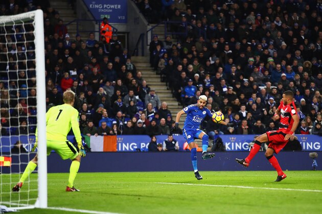 LEICESTER, ENGLAND - JANUARY 01:  Riyad Mahrez of Leicester City scores the opening goal during the Premier League match between Leicester City and Huddersfield Town at The King Power Stadium on January 1, 2018 in Leicester, England.  (Photo by Clive Mason/Getty Images)