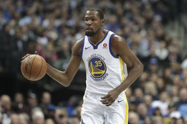 Golden State Warriors forward Kevin Durant dribbles during the first half of an NBA basketball game against the Dallas Mavericks in Dallas, Wednesday, Jan. 3, 2018. (AP Photo/LM Otero)