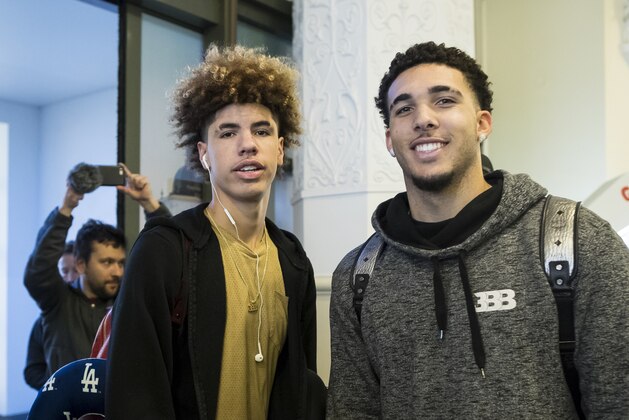 American basketball players LiAngelo Ball, right, and his brother, LaMelo, poses for a photo upon their arrival at the international airport in Vilnius, Lithuania, Wednesday, Jan. 3, 2018. LiAngelo and LaMelo Ball in December signed one-year contracts to play for Lithuanian professional basketball club Prienai - Birstonas Vytautas from a small of roughly 9000 people in southern Lithuania town Prienai, some 110 km (68 miles) of the Lithuanian capital Vilnius.(AP Photo/Mindaugas Kulbis)