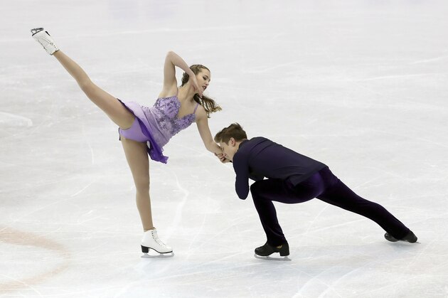 Christina Carreira and Anthony Ponomarenko of U.S perform during the Junior Ice Dance Free Dance at the ISU World Junior Figure Skating Championships 2017 in Taipei, Taiwan, Saturday, March 18, 2017. (AP Photo/Chiang Ying-ying)