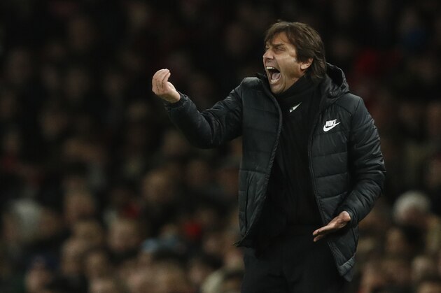 Chelsea's Italian head coach Antonio Conte gestures during the English Premier League football match between Arsenal and Chelsea at the Emirates Stadium in London on January 3, 2018.  / AFP PHOTO / Adrian DENNIS / RESTRICTED TO EDITORIAL USE. No use with unauthorized audio, video, data, fixture lists, club/league logos or 'live' services. Online in-match use limited to 75 images, no video emulation. No use in betting, games or single club/league/player publications.  /         (Photo credit should read ADRIAN DENNIS/AFP/Getty Images)