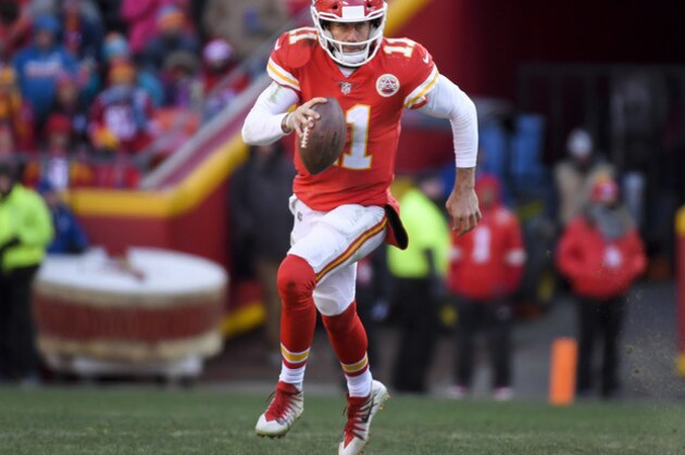 Kansas City Chiefs quarterback Alex Smith (11) runs with the ball during the second half of an NFL football game against the Miami Dolphins in Kansas City, Mo., Sunday, Dec. 24, 2017. (AP Photo/Reed Hoffmann)