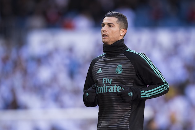 MADRID, SPAIN - DECEMBER 23: Cristiano Ronaldo of Real Madrid warms up prior to the La Liga 2017-18 match between Real Madrid and FC Barcelona at Santiago Bernabeu Stadium on December 23 2017 in Madrid, Spain. (Photo by Power Sport Images/Getty Images)