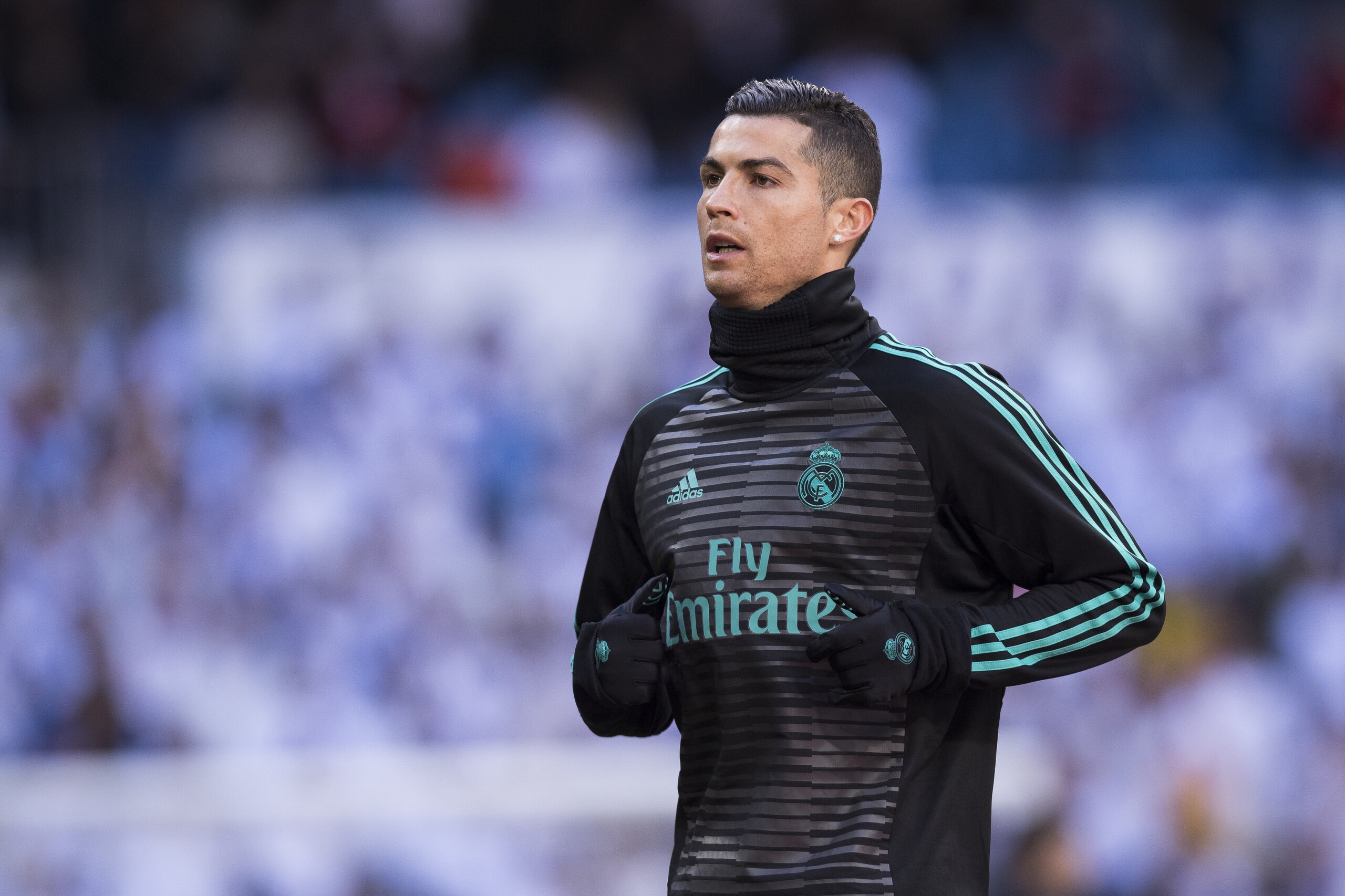 MADRID, SPAIN - DECEMBER 23: Cristiano Ronaldo of Real Madrid warms up prior to the La Liga 2017-18 match between Real Madrid and FC Barcelona at Santiago Bernabeu Stadium on December 23 2017 in Madrid, Spain. (Photo by Power Sport Images/Getty Images)