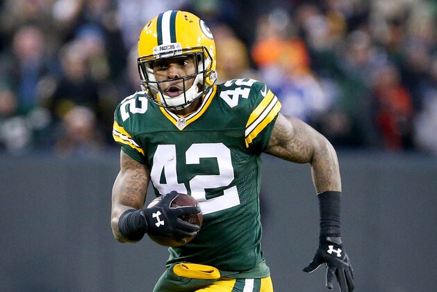 GREEN BAY, WI - DECEMBER 11:  Morgan Burnett #42 of the Green Bay Packers runs with the ball in the second quarter against the Seattle Seahawks at Lambeau Field on December 11, 2016 in Green Bay, Wisconsin. (Photo by Dylan Buell/Getty Images)