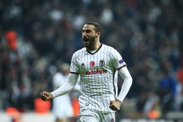 Besiktas' Cenk Tosun celebrates after scoring against Hapoel Beer-Sheva during a Europa League round of 32 second leg soccer match between Besiktas and Hapoel Beer-Sheva in Istanbul, Thursday, Feb. 23, 2017. Besiktas won the match 2-1. (AP Photo/Lefteris Pitarakis)