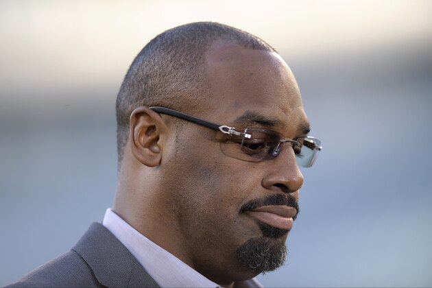 Former Philadelphia Eagles quarterback Donovan McNabb pauses during an interview before an NFL football game between the Philadelphia Eagles and the Kansas City Chiefs, Thursday, Sept. 19, 2013, in Philadelphia. (AP Photo/Michael Perez)