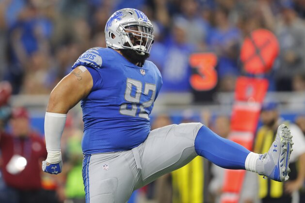 Detroit Lions defensive tackle Haloti Ngata (92) celebrates sacking Carolina Panthers quarterback Cam Newton during an NFL football game in Detroit, Sunday, Oct. 8, 2017. (AP Photo/Paul Sancya)