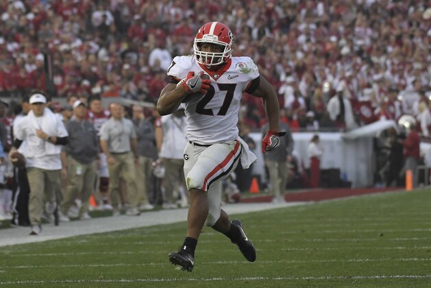 Georgia running back Nick Chubb (27) runs for a touchdown against Oklahoma during the second half of the Rose Bowl NCAA college football game Monday, Jan. 1, 2018, in Pasadena, Calif. (AP Photo/Mark J. Terrill)