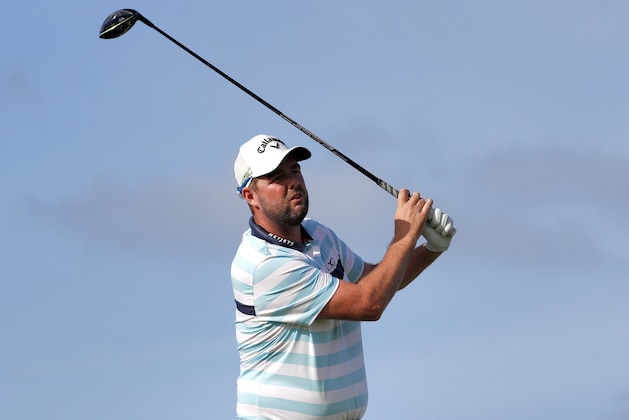 Marc Leishman plays his shot from the 14th tee during the second round of the Tournament of Champions golf event, Friday, Jan. 5, 2018, at Kapalua Plantation Course in Kapalua, Hawaii. (AP Photo/Matt York)
