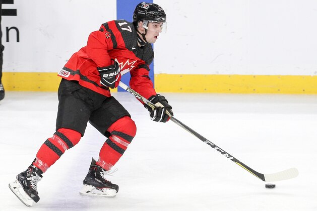 BUFFALO, NY - JANUARY 04: Tyler Steenbergen skates the puck up ice against the Czech Republic during the third period of play in the IIHF World Junior Championships Semifinal game at KeyBank Center on January 4, 2018 in Buffalo, New York. (Photo by Nicholas T. LoVerde/Getty Images)