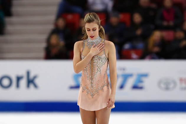 LAKE PLACID, NY - NOVEMBER 26:  Ashley Wagner of the United States reacts as she withdraws from the Ladies' Free Skate due to medical reasons during day three of 2017 Bridgestone Skate America at Herb Brooks Arena on November 26, 2017 in Lake Placid, New York.  (Photo by Tim Bradbury/Getty Images)