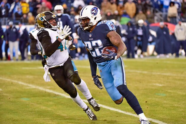 NASHVILLE, TN - DECEMBER 31:  Running back Derrick Henry #22 of the Tennessee Titans rushes against the Jacksonville Jaguars at Nissan Stadium on December 31, 2017 in Nashville, Tennessee.  (Photo by Frederick Breedon/Getty Images)