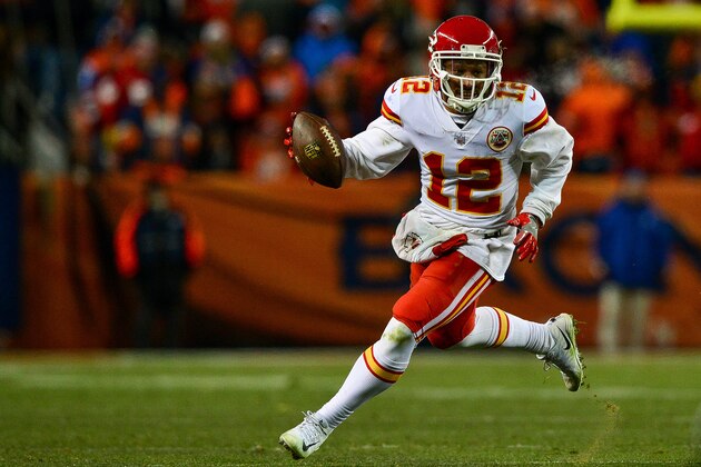 DENVER, CO - DECEMBER 31:  Wide receiver Albert Wilson #12 of the Kansas City Chiefs has yards after a catch against the Denver Broncos at Sports Authority Field at Mile High on December 31, 2017 in Denver, Colorado. (Photo by Dustin Bradford/Getty Images)