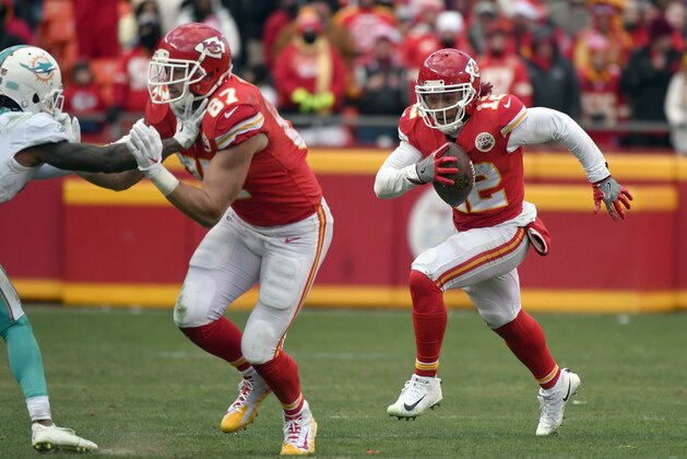 Kansas City Chiefs wide receiver Albert Wilson (12) carries the ball behind tight end Travis Kelce (87) during the second half of an NFL football game against the Miami Dolphins in Kansas City, Mo., Sunday, Dec. 24, 2017. (AP Photo/Ed Zurga)