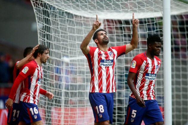 Atletico Madrid's Spanish forward Diego Costa celebrates a goal during the Spanish league football match Club Atletico de Madrid vs Getafe CF at the Wanda Metropolitano stadium in Madrid on January 6, 2018. / AFP PHOTO / OSCAR DEL POZO        (Photo credit should read OSCAR DEL POZO/AFP/Getty Images)