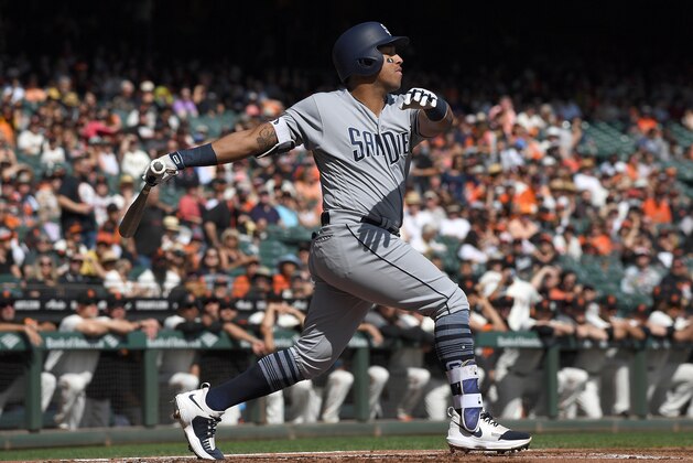 SAN FRANCISCO, CA - OCTOBER 01:  Yangervis Solarte #26 of the San Diego Padres bats against the San Francisco Giants in the top of the first inning at AT&T Park on October 1, 2017 in San Francisco, California.  (Photo by Thearon W. Henderson/Getty Images)