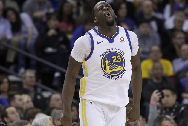 Golden State Warriors forward Draymond Green (23) reacts after missing a shot against the Utah Jazz during the second half of an NBA basketball game in Oakland, Calif., Wednesday, Dec. 27, 2017. (AP Photo/Jeff Chiu)