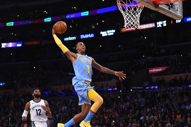 LOS ANGELES, CA - DECEMBER 27:  Kentavious Caldwell-Pope #1 of the Los Angeles Lakers gets past Tyreke Evans #12 of the Memphis Grizzlies for a dunk in the second half of the game at Staples Center on December 27, 2017 in Los Angeles, California.  (Photo by Jayne Kamin-Oncea/Getty Images). NOTE TO USER: User expressly acknowledges and agrees that, by downloading and or using this photograph, User is consenting to the terms and conditions of the Getty Images License Agreement.