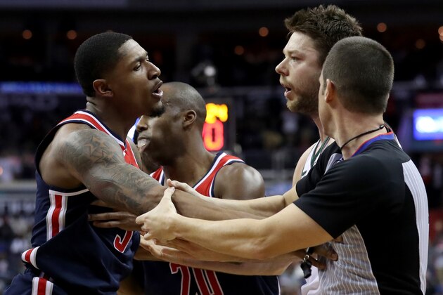WASHINGTON, DC - JANUARY 6: Bradley Beal #3 of the Washington Wizards and Matthew Dellavedova #8 of the Milwaukee Bucks are separated after Dellavedova fouled Beal and ejected in the second half at Capital One Arena on January 6, 2018 in Washington, DC. NOTE TO USER: User expressly acknowledges and agrees that, by downloading and or using this photograph, User is consenting to the terms and conditions of the Getty Images License Agreement. (Photo by Rob Carr/Getty Images)